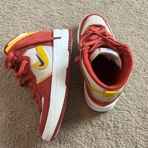 Nike Dunks high up ‘Cinnabar’